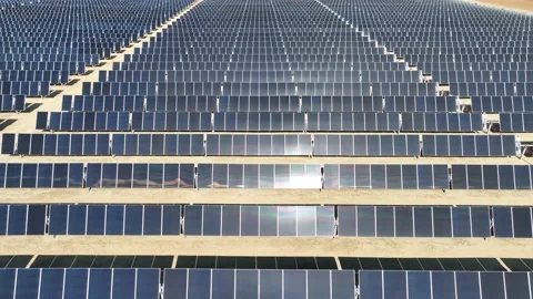 Aerial view over solar panels on a solar farm Stock Footage 204123088