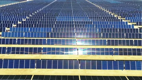 Aerial view over solar panels at solar farm producing sustainable energy Stock Footage 204759158