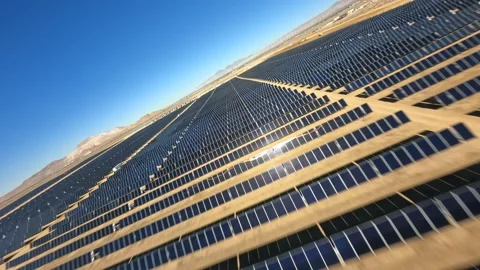 Aerial view over solar panels at solar farm producing sustainable energy. Stock Footage 205314678