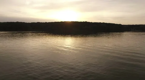 Aerial view over summer sunset on a lake Stock Footage 63539684