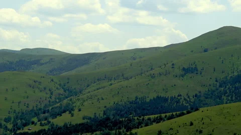 Aerial view over summer time landscape of mountain Zlatibor. Видео 220100529
