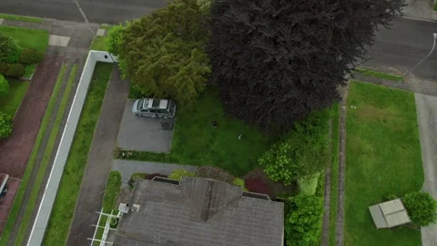Aerial view over Te Puke, New Zealand, highlighting a residential neighborhood Stock Footage 300753038