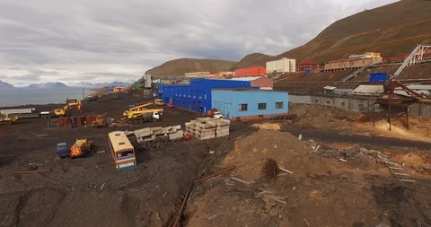 Aerial view over the territory of the mining settlement Barentsburg. Svalbard Stock Footage 121812658
