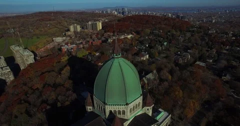 Aerial view over the top of St Joeseph Oratory in Montreal. Canada. Shot in 4K. Video stock 77760065