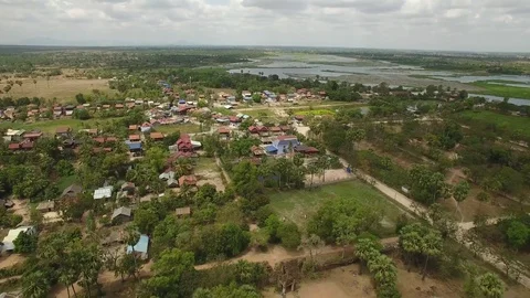 Aerial view over typical Cambodian village and Ta Prohm Temple, Cambodia Stock Footage 83533767