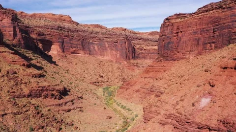 Aerial view over utah deep canyon with dry river in dried area Stock Footage 286812213