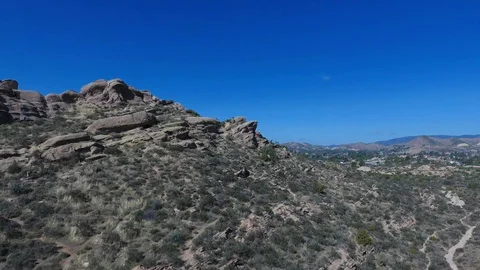 Aerial view over Vasquez Rocks in Agua Dulce California Stock Footage 125530454