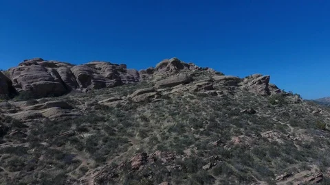Aerial view over Vasquez Rocks in Agua Dulce California Stock Footage 125532706