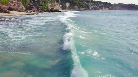 Aerial view over the waves of the ocean Stock Footage 263687277