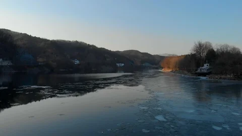 Aerial view over the winter river Stock Footage 117818863