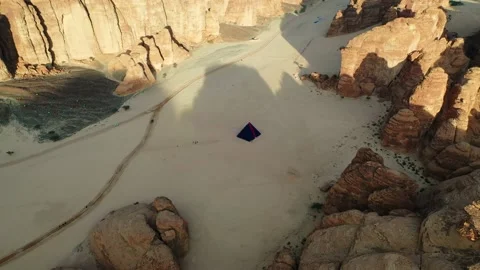 Aerial view overlooking the “A Concise Passage” pyramid by Rashid Stock Footage 214640025