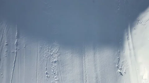 Aerial view overlooking a winter road, winter day - Top down, drone shot Stock Footage 239260805