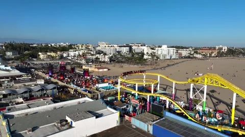 Aerial view of the Pacific park roller coaster and music festival in Santa Stock Footage 338066572