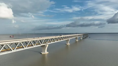 Aerial view of Padma bridge over the Padma river by day, Munshiganj, Bangladesh. Video stock 249688015