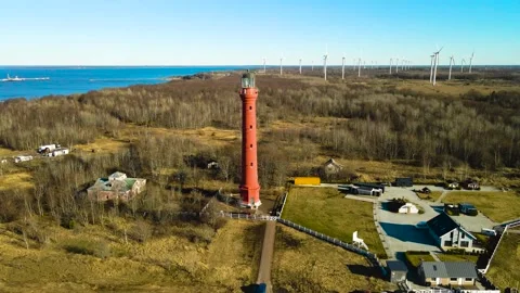 Aerial View of Pakri Lighthouse With Wind Turbine Farm Stock Footage 332622643