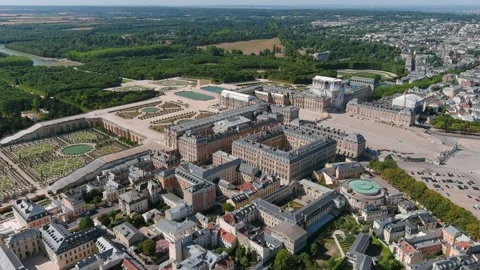 Aerial view of Palace of Versailles in Paris, historic royal residence, France Stock Footage