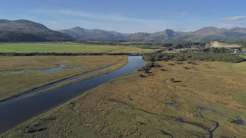 Aerial view, pan and forward move. Drone panorama over Glaslyn reserve wetlan Stock Footage 94245510