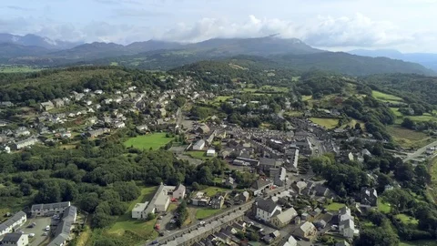 Aerial view, pan move. Drone panorama of Penrhyndeudraeth town in Snowdonia m 스톡 동영상 94232167