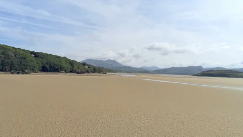 Aerial view, pan move. Drone panorama of Welsh tourist village Portmeirion in Video stock 94236282