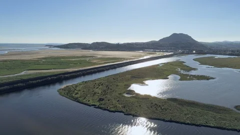 Aerial view, pan move. Drone panorama over Glaslyn wetlands, bridge and Pothm Video stock 94243826