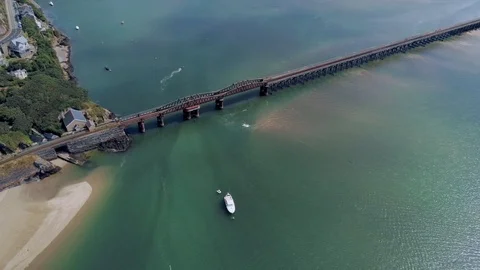 Aerial view, pan move. Drone panorama over sea, bridge, harbor, beach and tow Stock Footage 94253422