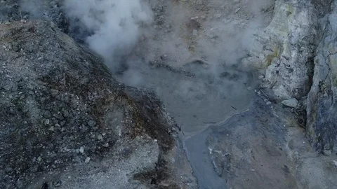 Aerial view pan of Volcanic Activity Boiling Geothermal Mud Stock Footage 124929387
