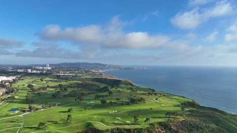 Aerial view panning left looking at Torrey Pines Golf Course and  Blacks Stock Footage 244910604