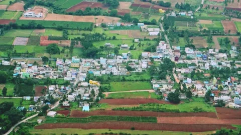 Aerial view panning over a vibrant rural landscape with patchwork agricultu.. Stock Footage 341354804