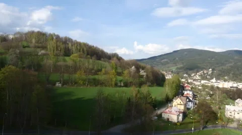 Aerial View. Panorama. Flight over a green grassy in mountains. Stock Footage 49564391