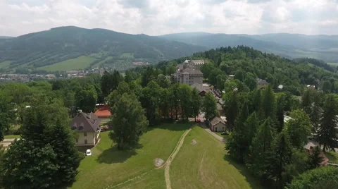 Aerial View. Panorama. Flight over a green grassy in mountains. Stock Footage 64252789