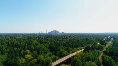 Aerial view panorama of intersection of road and railway near Chernobyl Stock Footage 123954464