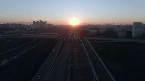 Aerial view panorama of multi-level transport interchange in the city at dawn Stock Footage 143370678