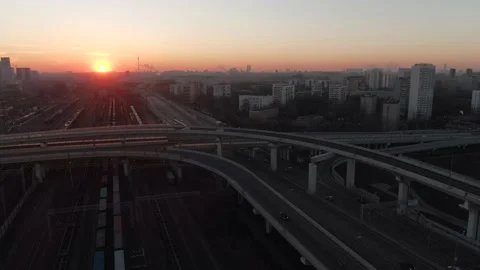 Aerial view panorama of multi-level transport interchange in the city at dawn Video stock 143370729
