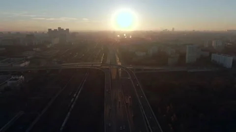Aerial view panorama of multi-level transport interchange in the city at dawn Stock Footage 143370766