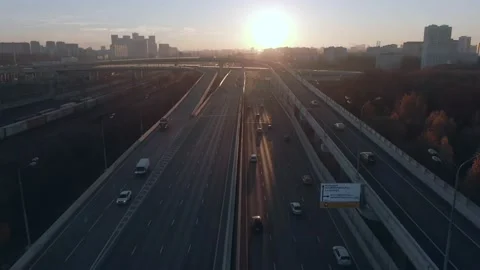 Aerial view panorama of multi-level transport interchange in the city at dawn Stock Footage 143370794