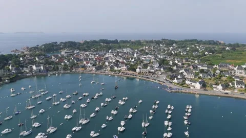 Aerial view of a panoramic aerial view of the picturesque port of Ploumanach and Stock Footage 346665047