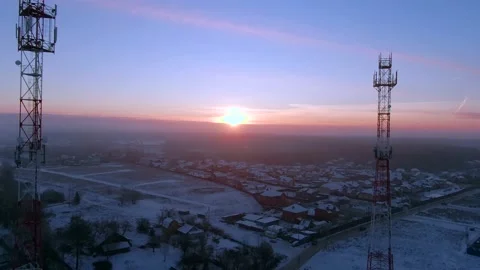 Aerial view panoramic landscape of cell towers at dawn in winter Video stock 144982279