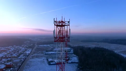 Aerial view panoramic landscape of cell towers at dawn in winter Video stock 144982360