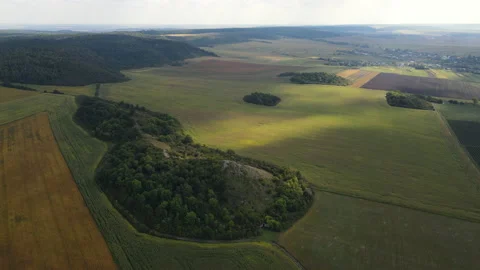 Aerial view of panoramic landscape, drone flies forwards over the agricultural Stock Footage 213517180