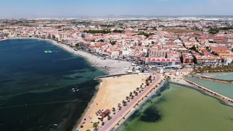 Aerial view panoramic view of coastal town and beaches of Lo Pagan. Spain Stock Footage 339867223