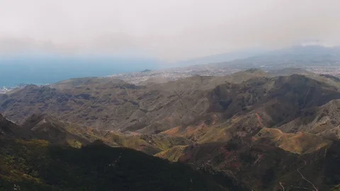 Aerial view - panoramic view of a green valley in a tropical climate. The bird Stock Footage 111308490