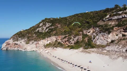 Aerial view of para glider flying over tropical sea in summer season on Mil.. Stock Footage 236552801