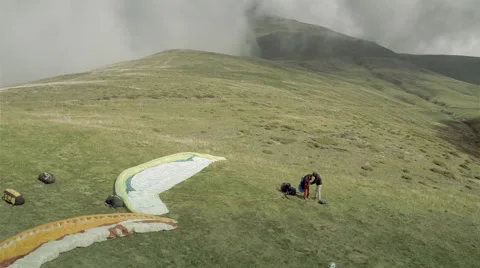 Aerial view of paragliders getting ready. Spain Stock Footage 43675486
