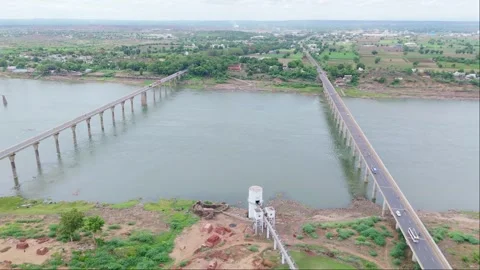 Aerial view of parallel bridges over a river Stock Footage 279869885