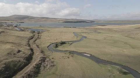 Aerial view of Paravani river floating in Saghamo Lake. Georgia Stock-Footage 161099325