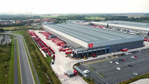 Aerial view parcel post distribution mail shipping hub descending right Stock Footage 162259048