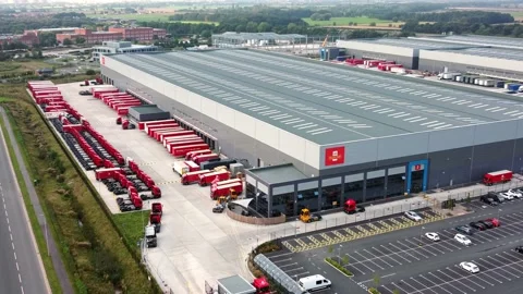 Aerial view parcel post distribution hub logistics lorry cargo containers Stock Footage 162259062