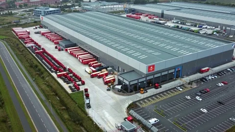 Aerial view parcel post distribution hub courier lorry cargo containers Stock Footage 162259236