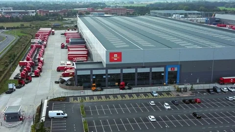 Aerial view parcel post distribution hub logistics lorry cargo containers Stock Footage 162259866