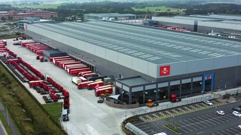 Aerial view parcel post distribution hub logistics lorry cargo containers Stock Footage 162259967